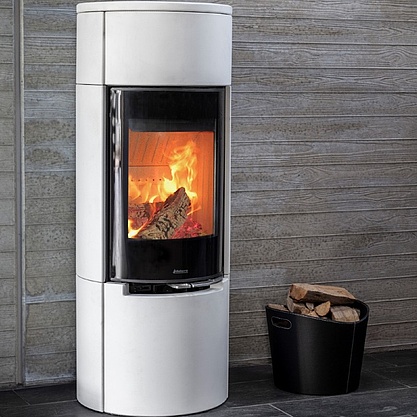 Elegant wood burning stove in bright ceramic