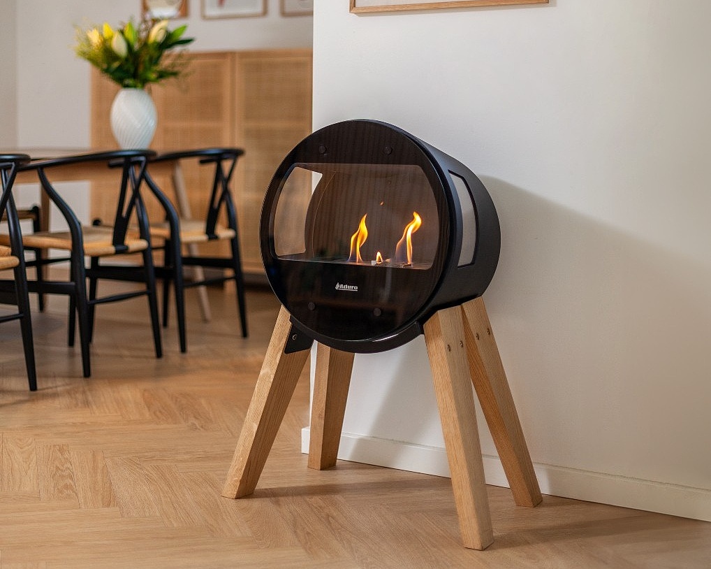 Aduro B1 bio stove on decorative wooden legs