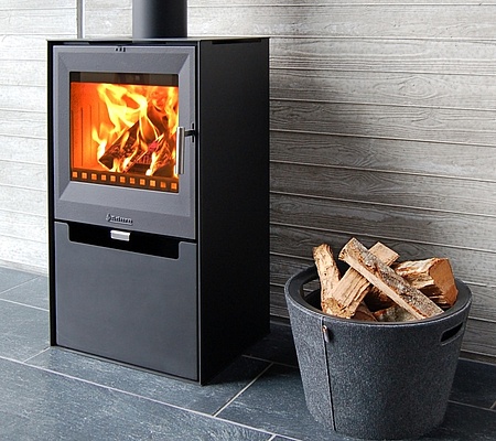Wood burning stove combines sheet iron and cast iron