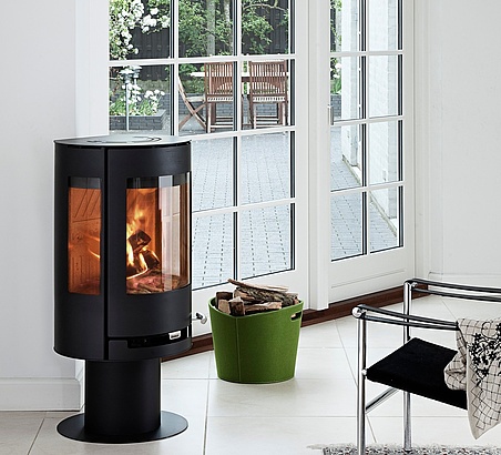 Aduro wood burning stove on pedestal